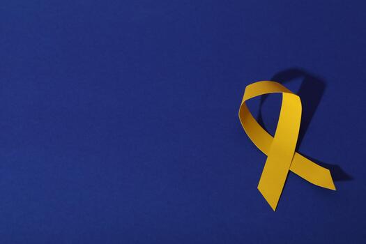 yellow ribbon on blue background